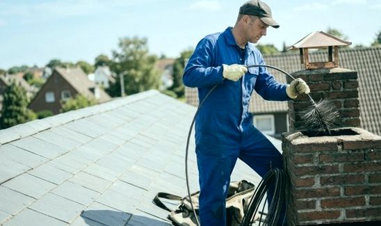 Sweep feeding a brush line into the mouth of a capped flue